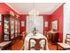 Formal dining room with a large table, chandelier, and built-in hutch at 5356 Hamps Rd., Nichols, SC 29581