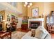 Bright living room with hardwood floors, a fireplace, and ample seating at 5356 Hamps Rd., Nichols, SC 29581