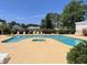 Relaxing community pool area with plenty of lounge chairs at 1025 Plantation Dr. W # 3421, Little River, SC 29566