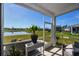 Enjoy waterfront views from this screened porch at 238 Marauder Dr., Longs, SC 29568