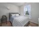 Cozy bedroom with a queen-size bed and a window at 238 Marauder Dr., Longs, SC 29568