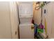 Stackable washer and dryer in small laundry closet at 4305 S Ocean Blvd. # 106, North Myrtle Beach, SC 29582