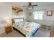 Bedroom with a double bed, nightstand, and ceiling fan at 4305 S Ocean Blvd. # 106, North Myrtle Beach, SC 29582