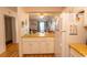 Kitchen features white cabinets, wood countertops, and appliances at 4305 S Ocean Blvd. # 106, North Myrtle Beach, SC 29582