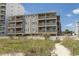 Beachfront condo building with ocean views and private beach access at 4305 S Ocean Blvd. # 106, North Myrtle Beach, SC 29582