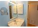 Bathroom vanity with sink and mirrored medicine cabinet at 4305 S Ocean Blvd. # 106, North Myrtle Beach, SC 29582