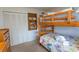 Bunk beds in a sunny bedroom with closet at 4305 S Ocean Blvd. # 106, North Myrtle Beach, SC 29582