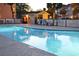 Inviting community pool with lounge chairs and a surrounding patio at 351 Lake Arrowhead Rd. # 11-342, Myrtle Beach, SC 29572