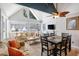 Charming dining area with vaulted ceilings, floral sofa and patio access at 351 Lake Arrowhead Rd. # 11-342, Myrtle Beach, SC 29572