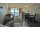 Oceanfront living room with seating and dining area, offering stunning ocean views at 6900 Ocean Blvd. # 936, Myrtle Beach, SC 29572