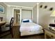 Small bedroom with a bed and access to the kitchen at 6900 Ocean Blvd. # 936, Myrtle Beach, SC 29572
