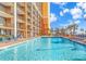 Large outdoor swimming pool with plenty of lounge chairs at 6900 Ocean Blvd. # 936, Myrtle Beach, SC 29572