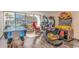 Gathering-friendly game room with air hockey and arcade games at 6900 Ocean Blvd. # 936, Myrtle Beach, SC 29572