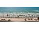 Balcony view of the beach with ocean and people at 6900 Ocean Blvd. # 936, Myrtle Beach, SC 29572