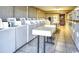 Well-lit laundry room with numerous washers and dryers at 6900 Ocean Blvd. # 936, Myrtle Beach, SC 29572