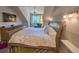 Spacious bedroom with a large bed, dresser, and a view of the outdoors at 226 Westleton Dr. # 19-D, Myrtle Beach, SC 29572