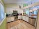 Modern kitchen featuring stainless steel appliances and granite countertops at 226 Westleton Dr. # 19-D, Myrtle Beach, SC 29572
