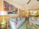 Living room with gray couch and green carpet at 226 Westleton Dr. # 19-D, Myrtle Beach, SC 29572