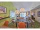 Bright dining area with glass table and open concept living area at 226 Westleton Dr. # 19-D, Myrtle Beach, SC 29572