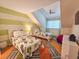 Two twin beds in a bright bedroom with green and white striped wall at 226 Westleton Dr. # 19-D, Myrtle Beach, SC 29572