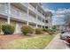 Building exterior with landscaping and walkway at 800 Crumpet Ct. # 1122, Myrtle Beach, SC 29579