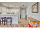 Kitchen features a breakfast bar and hardwood floors at 800 Crumpet Ct. # 1122, Myrtle Beach, SC 29579