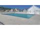 Community pool with surrounding deck and fenced-in area at 629 Swinford Dr., Myrtle Beach, SC 29588