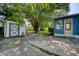 Backyard with a storage shed and a large patio area at 1119 Blue Ridge Trail, North Myrtle Beach, SC 29582