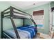 Bedroom with a bunk bed and window overlooking a pool at 6001-1573 S Kings Hwy., Myrtle Beach, SC 29575