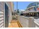 Charming front porch with white railing and a view of the neighborhood at 6001-1573 S Kings Hwy., Myrtle Beach, SC 29575