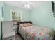 Bedroom with a double bed, window, and built-in shelves at 6001-1573 S Kings Hwy., Myrtle Beach, SC 29575