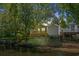Backyard cottage view of waterfront property with pond at 6001-1573 S Kings Hwy., Myrtle Beach, SC 29575