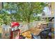 Deck overlooking a pond with seating, grill, and picnic table at 6001-1573 S Kings Hwy., Myrtle Beach, SC 29575