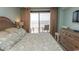 Main bedroom with ocean view and a walkout balcony at 523 S Ocean Blvd. S, North Myrtle Beach, SC 29582