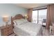 Main bedroom with ocean view and a walkout balcony at 523 S Ocean Blvd. S, North Myrtle Beach, SC 29582