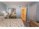 Bright bedroom with a queen bed and en-suite bathroom at 523 S Ocean Blvd. S, North Myrtle Beach, SC 29582