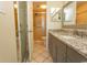 Bathroom with granite countertop and walk-in shower at 523 S Ocean Blvd. S, North Myrtle Beach, SC 29582