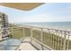 Balcony with ocean views and patio furniture at 523 S Ocean Blvd. S, North Myrtle Beach, SC 29582