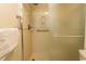 Walk-in shower with grab bars and a built-in seat at 523 S Ocean Blvd. S, North Myrtle Beach, SC 29582
