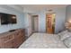 Main bedroom with dresser and bathroom access at 523 S Ocean Blvd. S, North Myrtle Beach, SC 29582