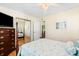 Comfortable bedroom with a double bed and mirrored closet at 6001 S Kings Hwy., Myrtle Beach, SC 29575