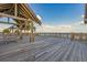 Beachfront deck with picnic tables and ocean views at 6001 S Kings Hwy., Myrtle Beach, SC 29575