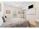 Serene bedroom with a queen bed and ceiling fan at 6001 S Kings Hwy., Myrtle Beach, SC 29575