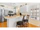Well-equipped kitchen featuring stainless steel appliances and white cabinetry at 6001 S Kings Hwy., Myrtle Beach, SC 29575