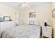 Bedroom with a double bed, white dresser, and ceiling fan at 6001 S Kings Hwy., Myrtle Beach, SC 29575