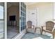 Relaxing balcony with two chairs and a view at 5801 Oyster Catcher Dr. # 432, North Myrtle Beach, SC 29582