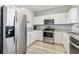 Modern kitchen featuring stainless steel appliances and granite countertops at 5801 Oyster Catcher Dr. # 432, North Myrtle Beach, SC 29582