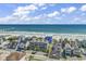 Aerial view showcasing beachfront location near pier at 217 S Ocean Blvd. # 201, Surfside Beach, SC 29575