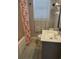 Bathroom with starfish shower curtain and white vanity at 329 54Th Ave. N, North Myrtle Beach, SC 29582