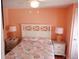 Bright bedroom with queen bed and coastal decor at 329 54Th Ave. N, North Myrtle Beach, SC 29582
